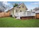 Charming home exterior featuring a cozy white deck and well-kept lawn, ideal for outdoor entertaining at 731 Mollie Se St, Atlanta, GA 30316