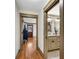 Hallway leading to bedroom and bathroom featuring hardwood floors at 731 Mollie Se St, Atlanta, GA 30316