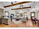 Spacious living room featuring hardwood floors, beamed ceilings, and ample natural light at 731 Mollie Se St, Atlanta, GA 30316