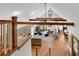 Bright, open-concept living room with exposed beams and hardwood floors at 731 Mollie Se St, Atlanta, GA 30316