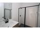 Modern bathroom features a glass enclosed shower, sleek fixtures, and a contemporary vanity at 4445 Beechnut Cir, Cumming, GA 30028