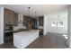 Well-appointed kitchen features a spacious island, stainless steel appliances, and ample cabinet space at 4445 Beechnut Cir, Cumming, GA 30028