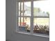 A bright window with a view of the landscaped yard in the distance at 4445 Beechnut Cir, Cumming, GA 30028