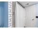 Bathroom featuring a shower with white subway tile, a white shower curtain, and blue painted walls at 6851 Roswell Rd # M12, Sandy Springs, GA 30328