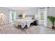 Serene bedroom with wood-look floors, neutral walls, large windows, and a comfortable bed at 6851 Roswell Rd # M12, Sandy Springs, GA 30328