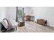 Bedroom with a workstation, hardwood floors, and neutral paint at 6851 Roswell Rd # M12, Sandy Springs, GA 30328