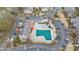 Aerial view of a gated community pool with ample parking and well-maintained landscaping at 6851 Roswell Rd # M12, Sandy Springs, GA 30328