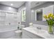 Bathroom featuring a tub, modern vanity, and decorative plants at 10664 Sandpiper Road Rd, Jonesboro, GA 30238