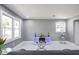 Bright living room features marble floors, gray walls and large windows at 10664 Sandpiper Road Rd, Jonesboro, GA 30238