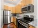 Well-equipped kitchen features stainless steel appliances and beautiful countertops at 1144 Blue Ridge Ne Ave # 6, Atlanta, GA 30306