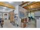 An unfinished basement with visible ductwork, a workbench and shelving storage at 1881 Holman Rd, Hoschton, GA 30548