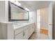 Spacious bathroom with a double sink vanity, tile floors, and large mirror at 3445 Stratford Ne Rd # 2403, Atlanta, GA 30326