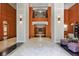 Spacious lobby featuring wood accents, tall columns, and marble flooring at 3445 Stratford Ne Rd # 2403, Atlanta, GA 30326