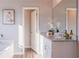 Elegant bathroom featuring granite countertops, a modern sink, and stylish accents that create a spa-like retreat at 8486 Big Cedar Ct, Riverdale, GA 30274