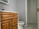 Cozy bathroom featuring vanity and toilet at 10836 Mallard Dr, Jonesboro, GA 30238