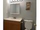 Bathroom featuring a vanity with storage and a bright mirror at 10836 Mallard Dr, Jonesboro, GA 30238