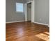 This bedroom boasts hardwood floors, and a closet for storage at 10836 Mallard Dr, Jonesboro, GA 30238