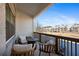 Relaxing balcony with outdoor seating, offering views of the neighborhood at 127 Harlow Cir, Roswell, GA 30076