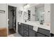 Modern bathroom with double sinks, walk-in shower, and neutral color palette at 127 Harlow Cir, Roswell, GA 30076