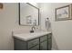 Bathroom vanity with a sleek mirror, quartz countertop and updated fixtures at 800 Peachtree Ne St # 8508, Atlanta, GA 30308