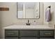 Close up of bathroom vanity, showing the quartz countertop, modern hardware, and updated fixtures at 800 Peachtree Ne St # 8508, Atlanta, GA 30308