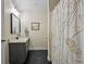 Bathroom featuring modern fixtures, neutral paint, and a patterned shower curtain at 800 Peachtree Ne St # 8508, Atlanta, GA 30308