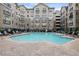 Large outdoor community pool with lounge chairs for relaxation at 800 Peachtree Ne St # 8508, Atlanta, GA 30308