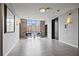 Lobby with exposed brick, seating area, and a view of the city from the large picture window at 800 Peachtree Ne St # 8508, Atlanta, GA 30308