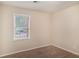 Bedroom with a neutral carpet, neutral walls, a window with blinds, and ample natural light at 3005 Hidden Dr, Lawrenceville, GA 30044
