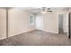 Spacious bedroom with carpet, closet, and a ceiling fan for added comfort at 3005 Hidden Dr, Lawrenceville, GA 30044