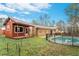 Exterior shot of backyard with pool at 1495 Harbour Oaks Rd, Tucker, GA 30084