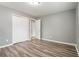 Bedroom with hardwood flooring and closet space at 1495 Harbour Oaks Rd, Tucker, GA 30084