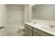 This bathroom features double sinks and shower and bath at 4098 Fairlady Ct, Kennesaw, GA 30144