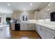 Well-lit kitchen with plenty of cabinet space, modern appliances, and hardwood floors at 400 Laurel Chase Ct, Atlanta, GA 30327