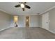 Spacious main bedroom featuring neutral walls and carpeted floors at 2382 Smokehouse Path, Lawrenceville, GA 30044