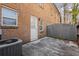 Backyard with patio and privacy fence surrounding the property at 265 Winding River Dr # F, Atlanta, GA 30350