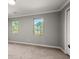 Bedroom with neutral carpet and natural lighting at 265 Winding River Dr # F, Atlanta, GA 30350