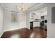 Open dining area adjacent to the kitchen, featuring hardwood floors and natural light, great for everyday meals at 265 Winding River Dr # F, Atlanta, GA 30350