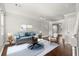 Bright living room with modern furnishings, hardwood floors, and stylish decor for comfortable living at 265 Winding River Dr # F, Atlanta, GA 30350