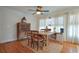 Warm dining room with wooden table set and vintage furnishings at 7045 Shane Ln, Cumming, GA 30028