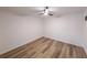 Bedroom includes vinyl floors, recessed lights, and a ceiling fan at 7602 Auden Trl, Atlanta, GA 30350