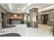 Stunning lobby with tile floors, reception desk, columns, and decorative lighting at 2870 Pharr Nw Ct # 2008, Atlanta, GA 30305