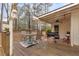 View of the outdoor deck with seating, a grill, and a ceiling fan at 4648 Seward Rd, Powder Springs, GA 30127