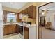 Kitchen with wood cabinets, white counter tops, and an oven and stove range at 4648 Seward Rd, Powder Springs, GA 30127