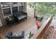 Cozy back porch featuring wooden furniture at 4648 Seward Rd, Powder Springs, GA 30127