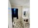 Updated bathroom featuring patterned tile floor and updated vanity at 120 Mossy Brook Dr, Stockbridge, GA 30281