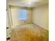 Simple bedroom featuring a neutral color and carpet flooring at 120 Mossy Brook Dr, Stockbridge, GA 30281