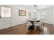 Bright and airy dining room with hardwood floors, a modern light fixture, and ample natural light at 1558 Grant Ne Dr, Atlanta, GA 30319