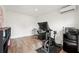 Home exercise room featuring modern fitness equipment, desk, and climate control at 1558 Grant Ne Dr, Atlanta, GA 30319