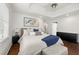 Bright main bedroom features tray ceiling, large windows and dark hardwood flooring at 1558 Grant Ne Dr, Atlanta, GA 30319